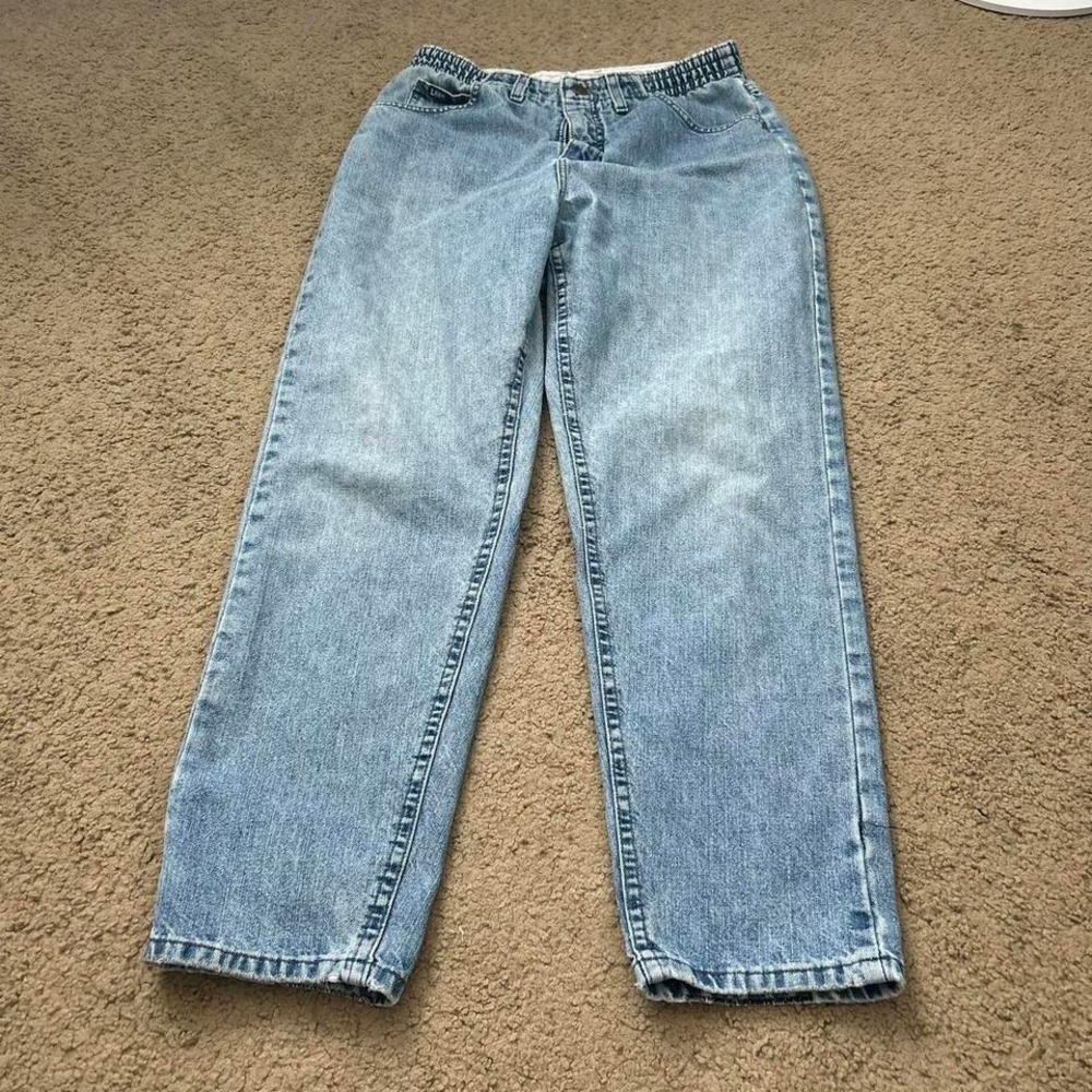 Vintage Lee blue denim jeans with a relaxed fit